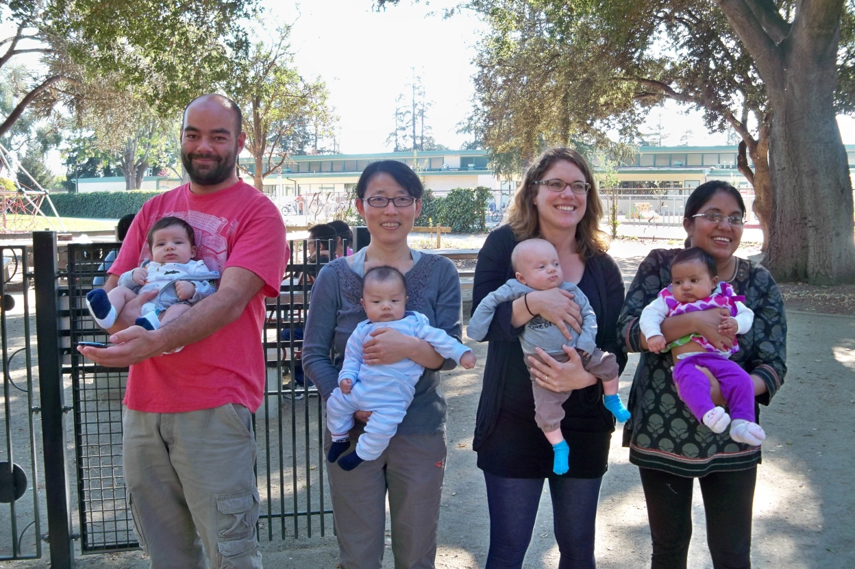 photo of Dr. Li-Qing Chen with baby son and friends