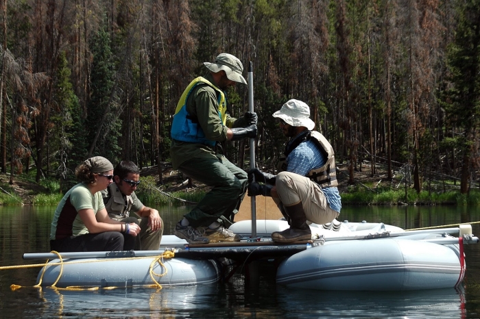 Dunnette, Higuera, and National Park employees collect samples from Chickaree Lake, Colorado, USA. Photo: Grace Carter