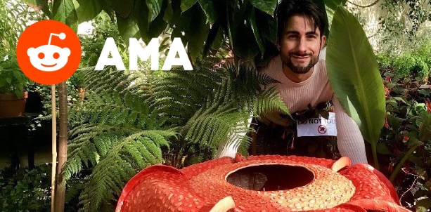 Chris Thorogood with Rafflesia model in leafy greenhouse