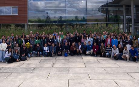 A group photo of delegates at the 2025 iMMM conference.