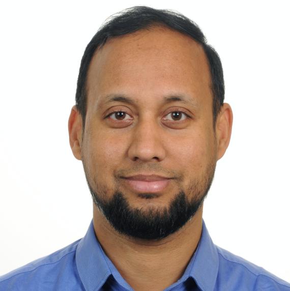 Chhana Ullah wearing a blue shirt with a white background