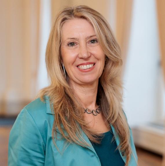 Christiane Werner in a teal blazer