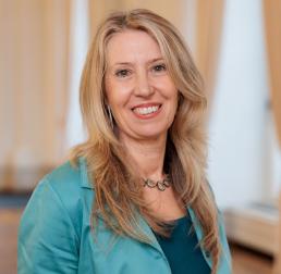 Christiane Werner in a teal blazer