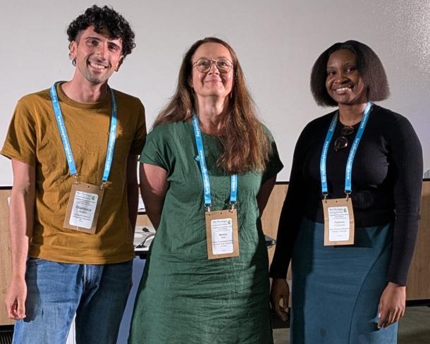 Gianluca Grasso, Maarja Öpik and Patience Chatukuta standing side by side.