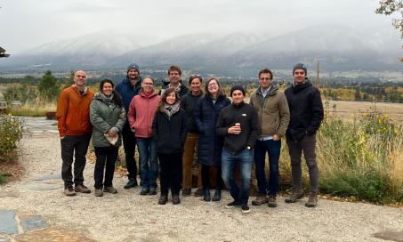 The participants from the 34th New Phytologist workshop, a group of 11 people standing in front of a mountain range